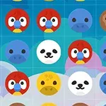 Färgglada cirklar med ansikten av olika djur emojis ordnade i ett rutmönster