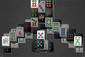 Bild med staplade mahjong-brickor i olika färger och symboler mot en mörk bakgrund