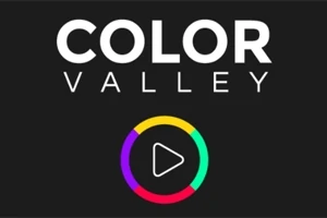 Texten COLOR VALLEY i vitt ovanför en flerfärgad cirkel med en spelknapp på svart bakgrund