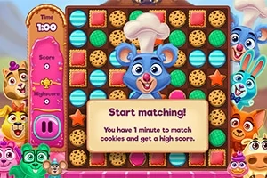 Ett färgglatt pusselspel med tecknade djur och ett brädspel fyllt med kex och godis