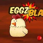 Tecknad kyckling med färgglada bollar och texten EGGZ BLAST!