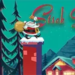 Tomten står på en skorsten med en säck och presenter, omgiven av snöbeklädda träd och ett upplyst hus i bakgrunden